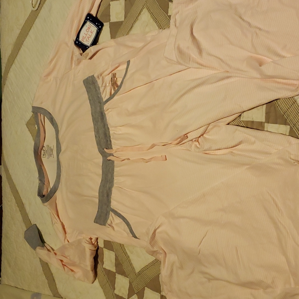 NWT 2pc pj. Light weight super soft. Large pocket on top. 2 pockets bottom